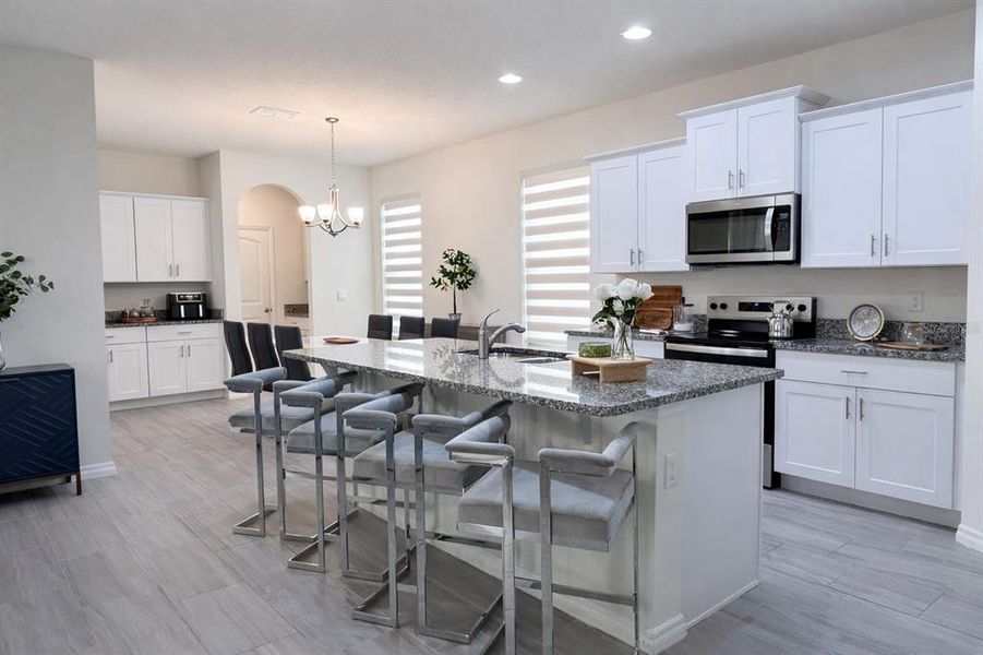 Furnished interior view inside a new home in Waterleigh, Winter Garden (Image 17).