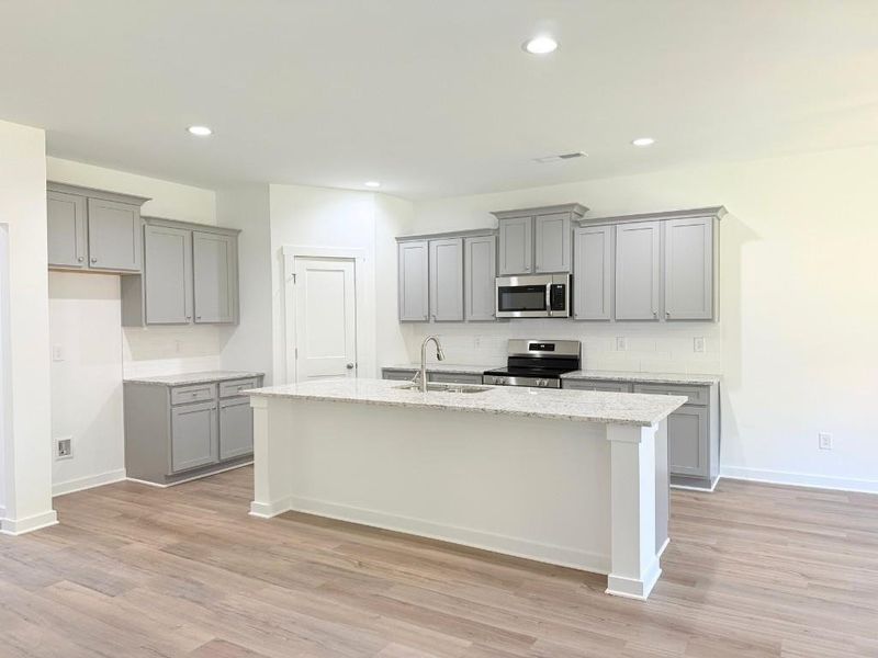 Furnished interior view inside a new home in Westlyn, Winder (Image 10).