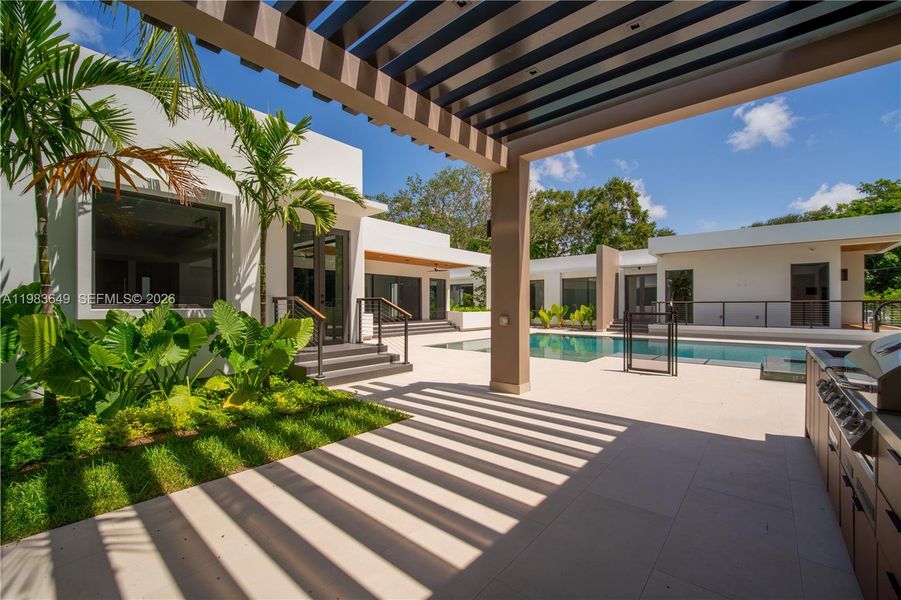 Exterior details and patio area of a home in , Pinecrest (Image 12). Exterior details and patio area of a home in , Pinecrest (Image 12).
