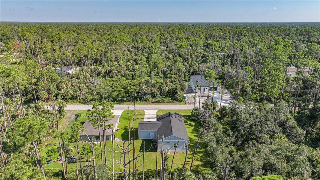 Front exterior of a new home in , Port Charlotte, FL, highlighting curb appeal (Image 17).