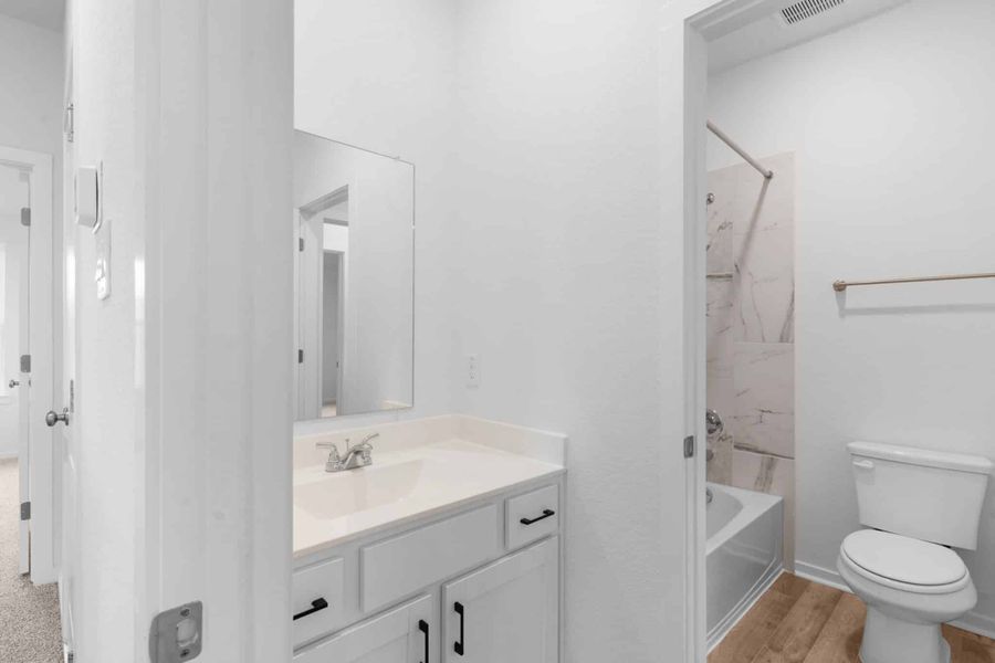 Furnished interior view inside a new home in Highland Village, Georgetown (Image 11).