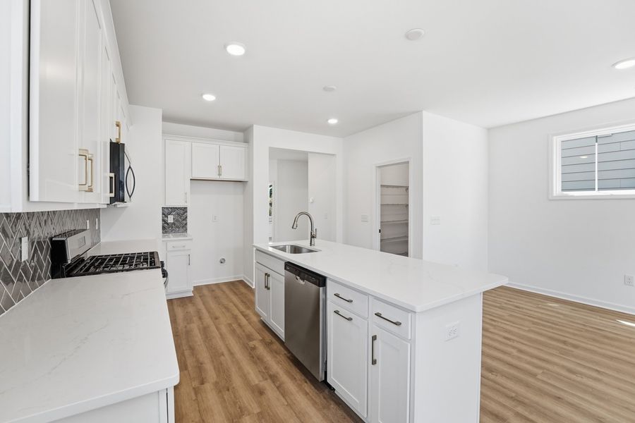 Representative furnished interior of a home built from the Blair by Brookfield Residential in Wendell Falls, Wendell (Image 6).
