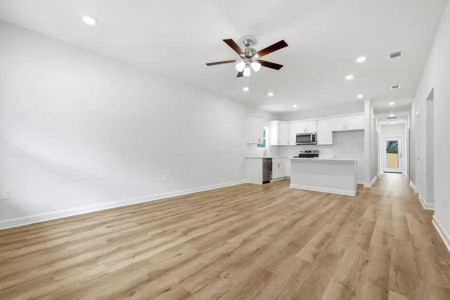 Spacious, unfurnished interior of a new home in Live Oak Cottages, Freeport (Image 27). Spacious, unfurnished interior of a new home in Live Oak Cottages, Freeport (Image 27).