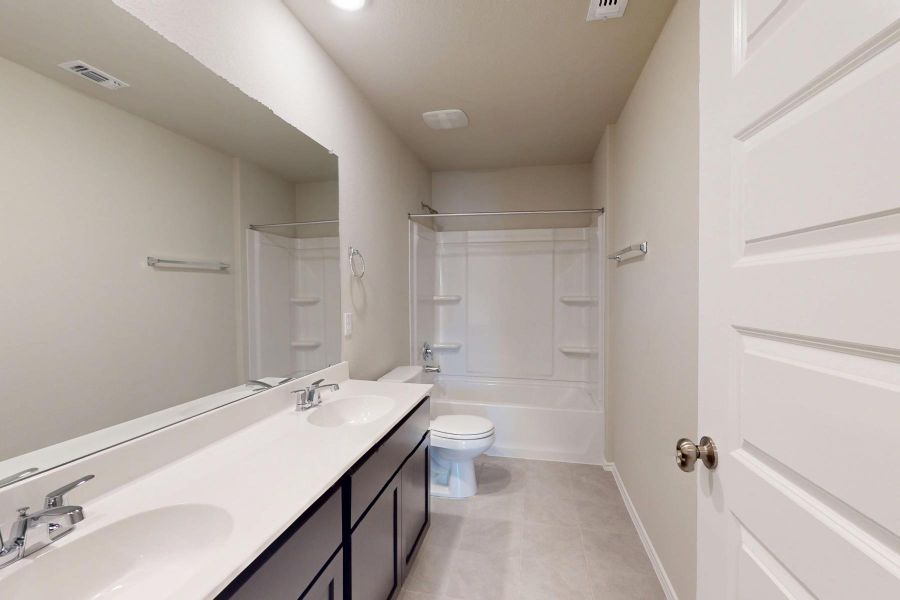 Furnished interior view inside a new home in Carillon, Manor (Image 14).