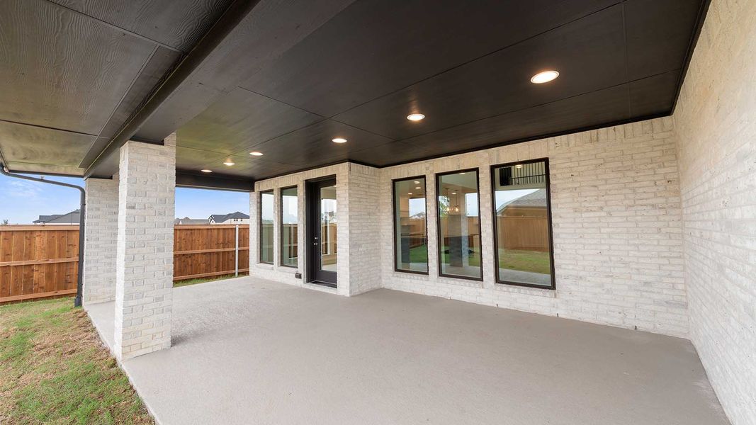 Exterior details and patio area of a home in Cambridge Crossing, Celina (Image 3).