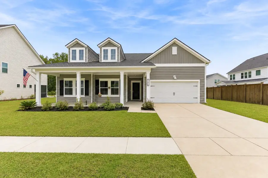 Front exterior of a new home in , Summerville, SC, highlighting curb appeal (Image 27).