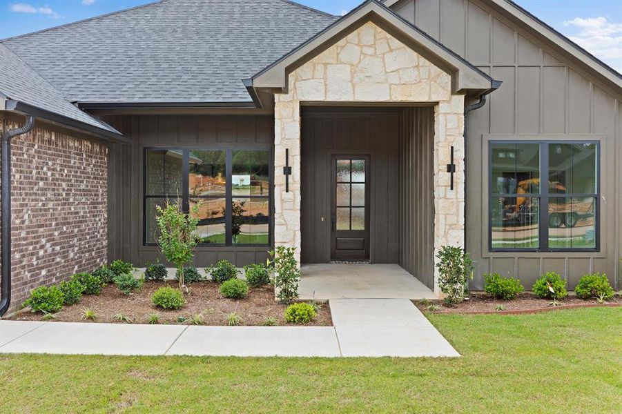 Exterior details and patio area of a home in , Lindale (Image 26).