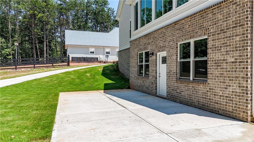 Front exterior of a new home in , Canton, GA, highlighting curb appeal (Image 30).