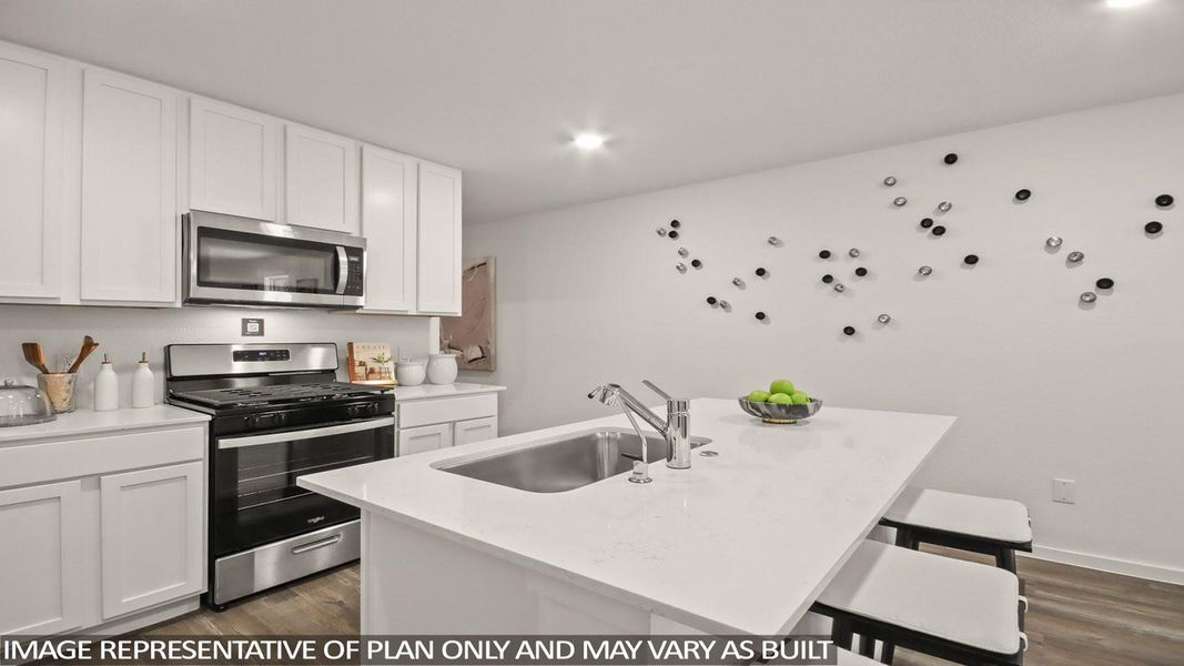 Furnished interior view inside a new home in Sunterra, Katy (Image 6).