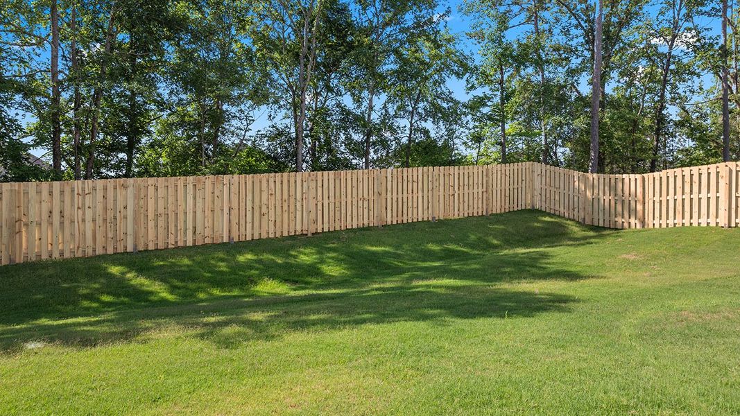 Exterior details and patio area of a home in Estates at Deer Hollow, Grovetown (Image 22).