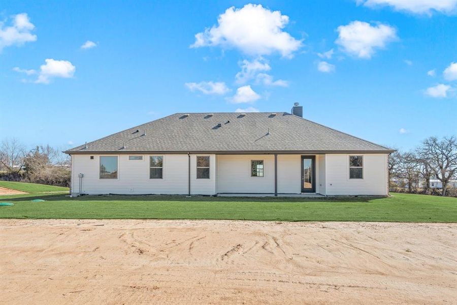 Front exterior of a new home in Saddleback Estates, Boyd, TX, highlighting curb appeal (Image 21).