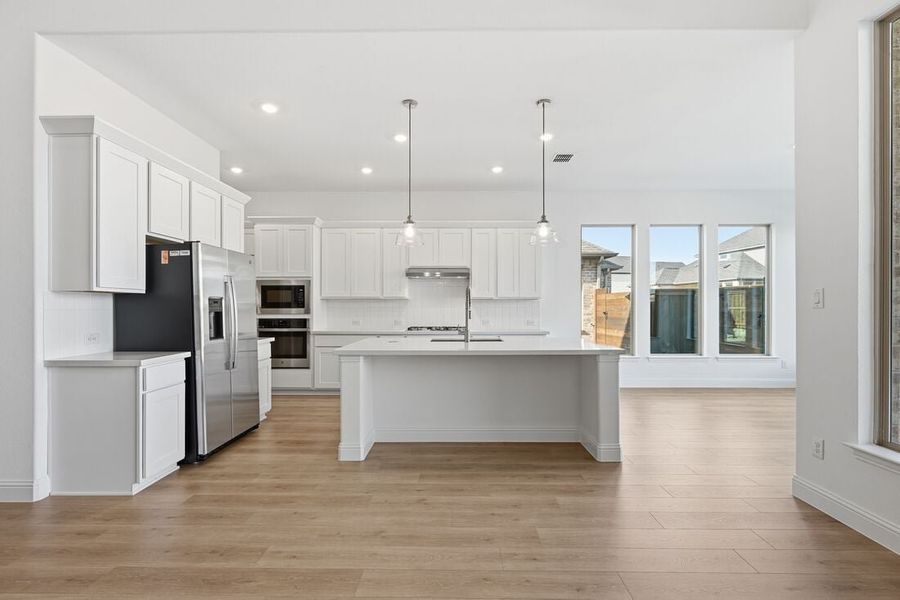 Representative furnished interior of a home built from the Rhone by Taylor Morrison in South Oak 50s, Oak Point (Image 4).