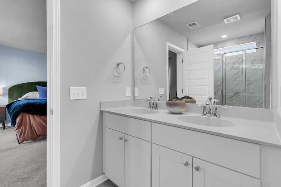 Furnished interior view inside a new home in Sweetgrass at Summers Corner: Arbor Collection, Summerville (Image 15). Furnished interior view inside a new home in Sweetgrass at Summers Corner: Arbor Collection, Summerville (Image 15).