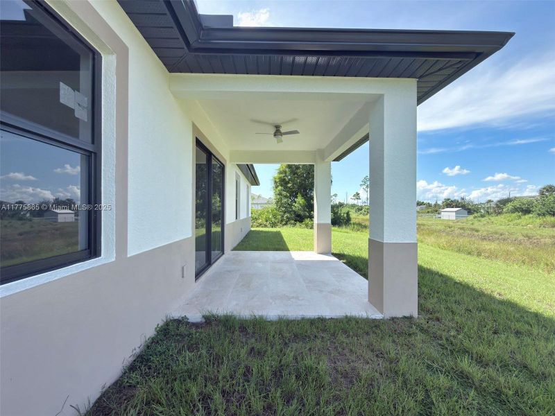 Exterior details and patio area of a home in , Lehigh Acres (Image 3).