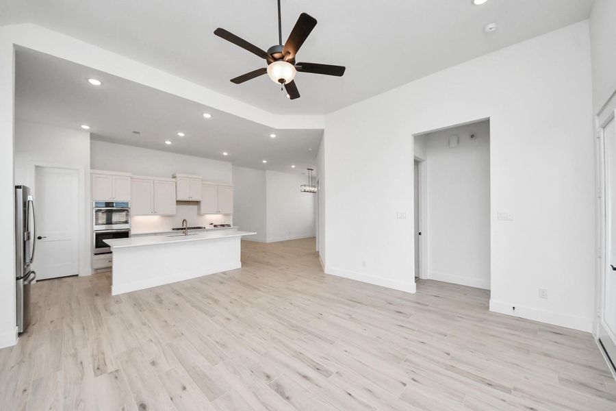 Spacious, unfurnished interior of a new home in Meridiana Courtyard Collection, Manvel (Image 24).