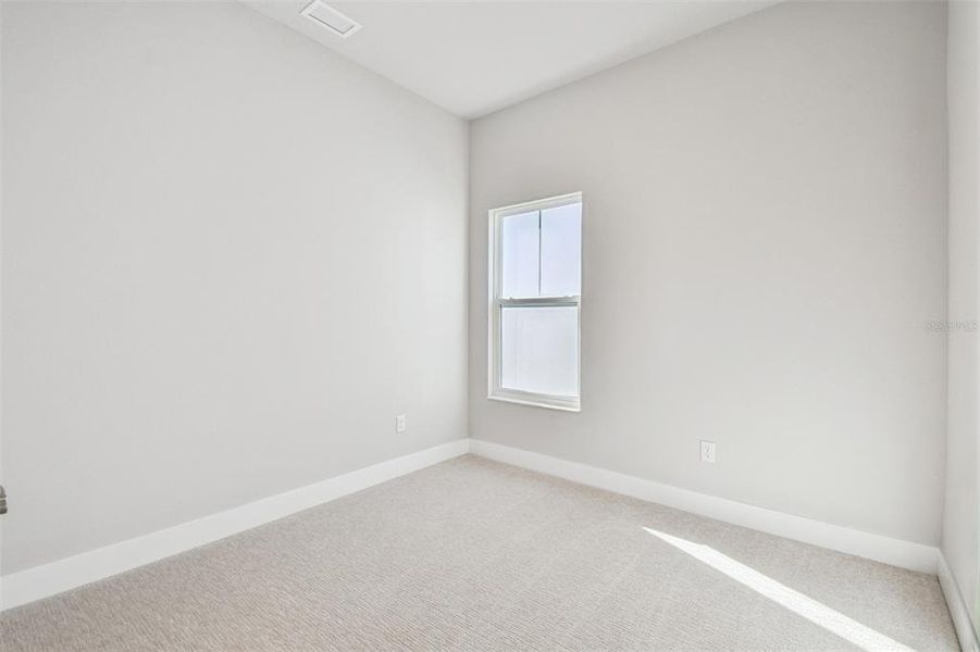 Spacious, unfurnished interior of a new home in Emerald Landing at Waterside at Lakewood Ranch – Cottage Series, Sarasota (Image 33). Spacious, unfurnished interior of a new home in Emerald Landing at Waterside at Lakewood Ranch – Cottage Series, Sarasota (Image 33).