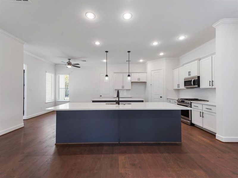 Another view of the kitchen! (Sample photos of a completed Warwick floor plan. The image may feature alternative selections and/or upgrades.)