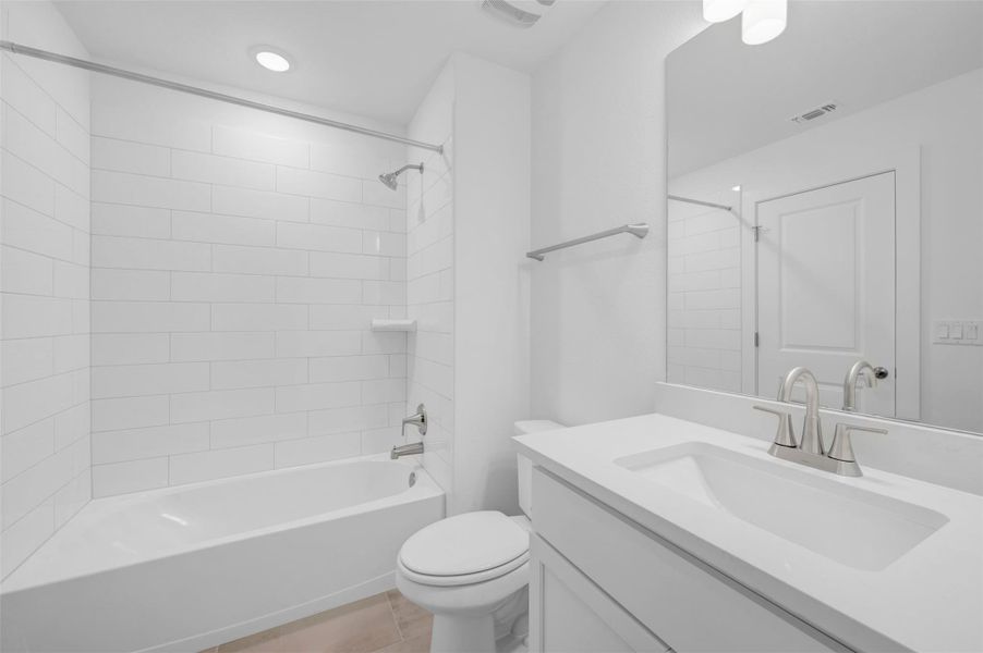 Furnished interior view inside a new home in Edgewood, Leander (Image 14). Furnished interior view inside a new home in Edgewood, Leander (Image 14).