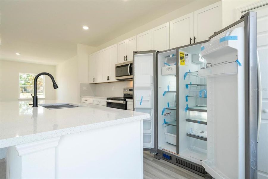 Furnished interior view inside a new home in , Citrus Springs (Image 12).