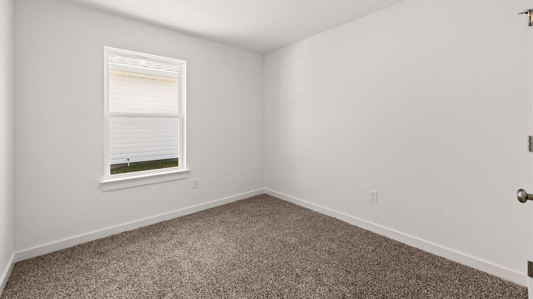 Spacious, unfurnished interior of a new home in Magnolia at the Bluffs Phase 3, Freeport (Image 23).