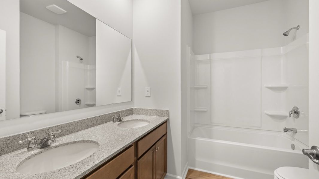 Representative furnished interior of a home built from the Denton by D.R. Horton in Fairway 17 at Mirror Lake, Villa Rica (Image 12). Representative furnished interior of a home built from the Denton by D.R. Horton in Fairway 17 at Mirror Lake, Villa Rica (Image 12).