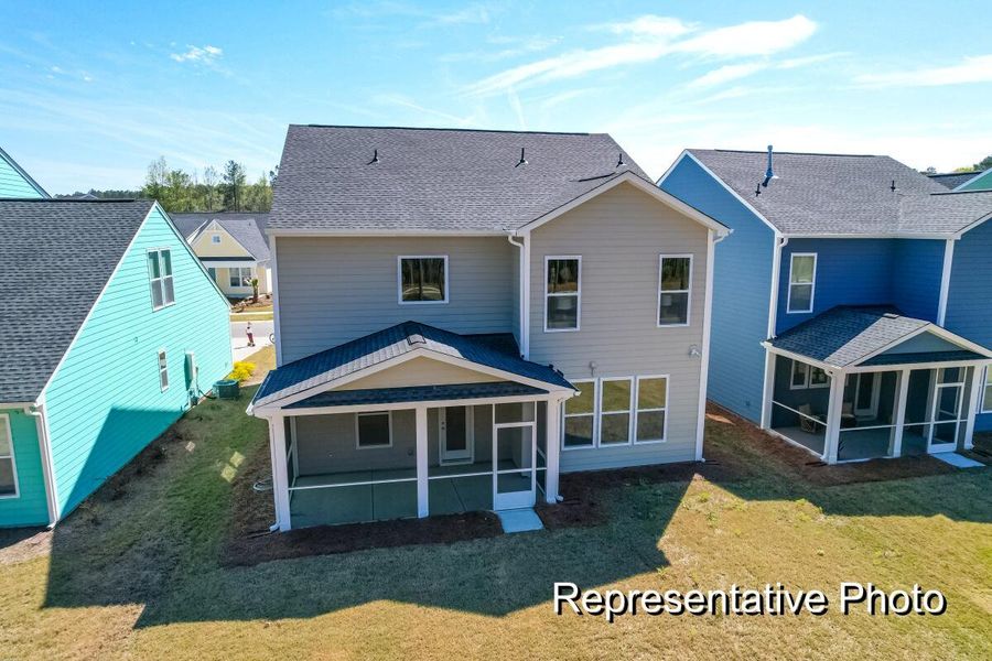 Front exterior of a new home in , Ravenel, SC, highlighting curb appeal (Image 2).