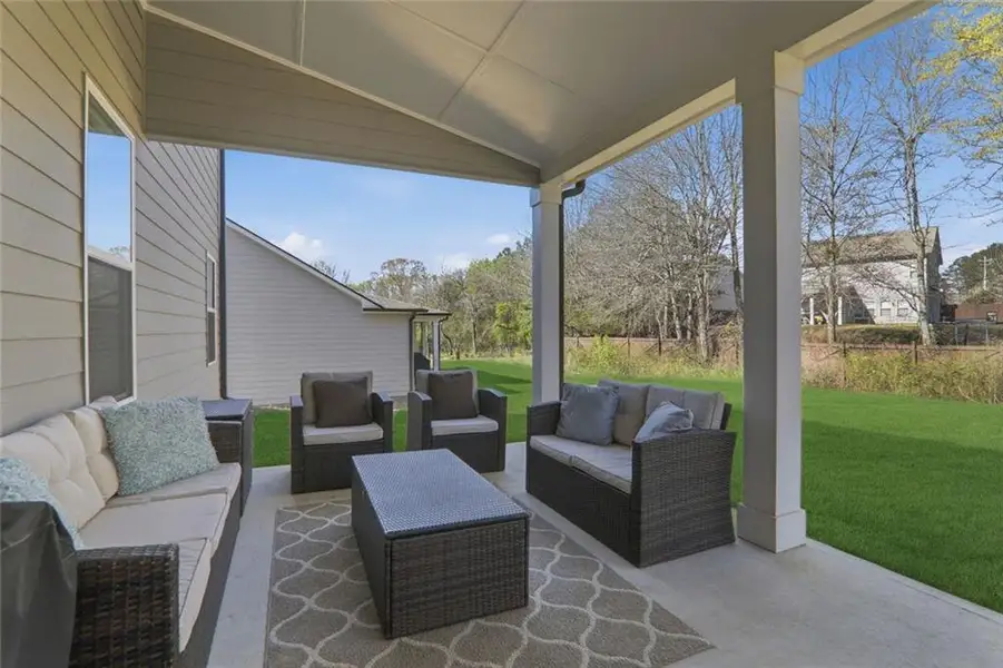 Exterior details and patio area of a home in Rosewood Lake Estates, Hoschton (Image 4). Exterior details and patio area of a home in Rosewood Lake Estates, Hoschton (Image 4).