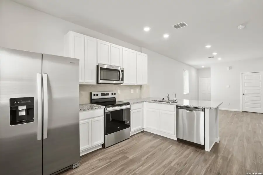 Furnished interior view inside a new home in Melissa Ranch, San Antonio (Image 7).