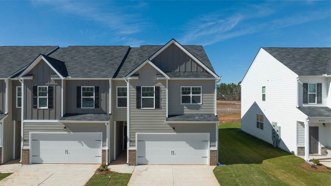 Representative exterior photo of a completed home built from the Sudbury by D.R. Horton in Laurel Park Townhomes, Hephzibah, GA (Image 1).