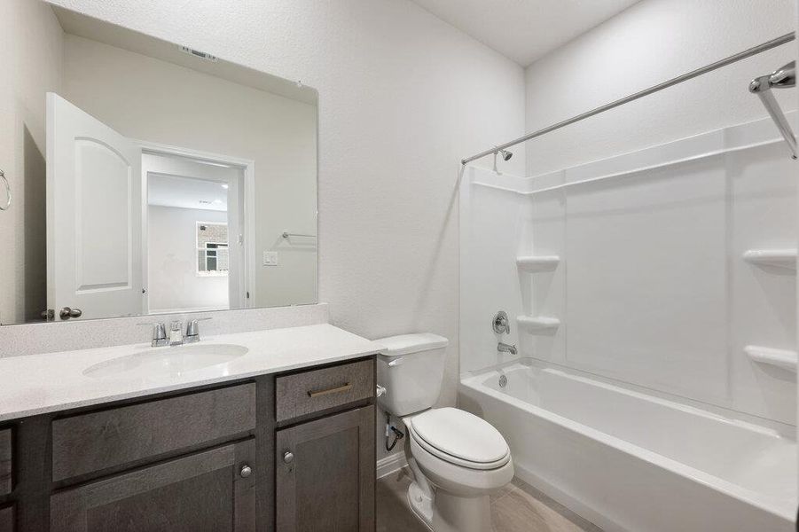 Furnished interior view inside a new home in La Cima, San Marcos (Image 11).