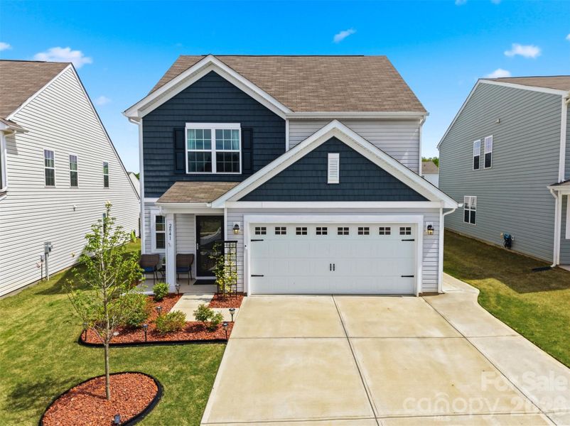 Front exterior of a new home in Legacy Ridge, Catawba, NC, highlighting curb appeal (Image 2). Front exterior of a new home in Legacy Ridge, Catawba, NC, highlighting curb appeal (Image 2).