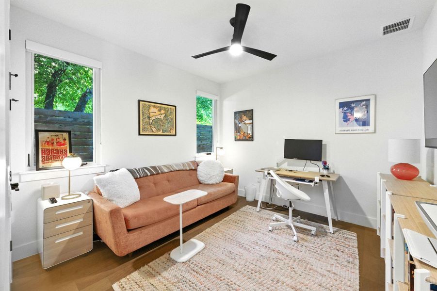 Bedroom #1 on 1st floor with two windows gets good natural light. Presently used as an office. Bedroom #1 on 1st floor with two windows gets good natural light. Presently used as an office.