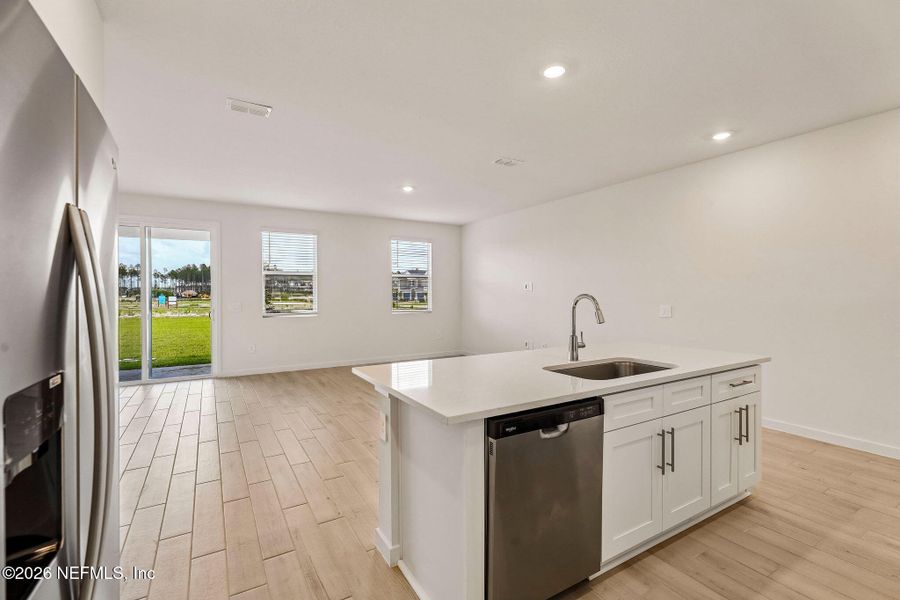 Furnished interior view inside a new home in The District at Oakleaf - The Grove, Middleburg (Image 7).
