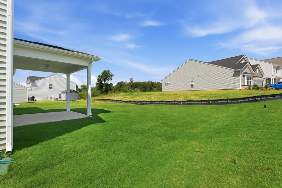 Exterior details and patio area of a home in Piper Creek, Newton (Image 27).
