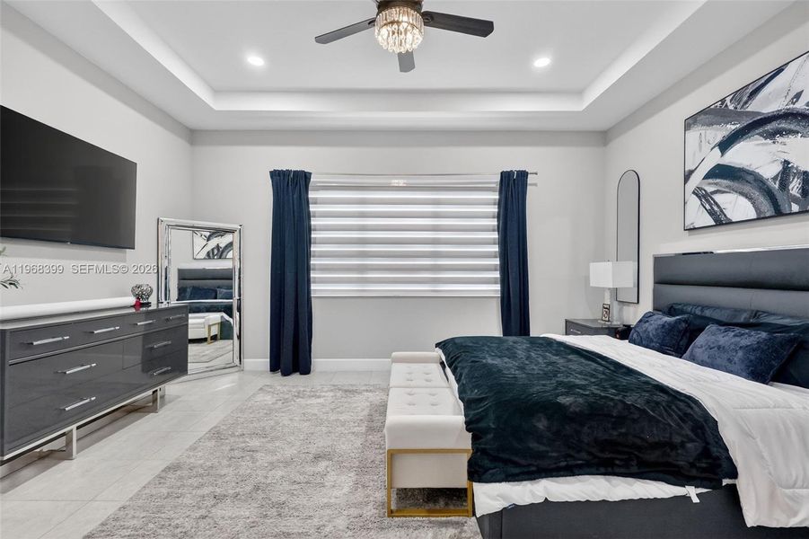 Primary suite with motorized blinds for added comfort and privacy.