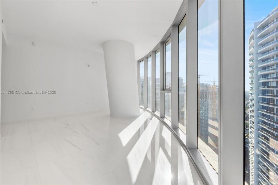 Spacious, unfurnished interior of a new home in Aston Martin Residences, Miami (Image 19). Spacious, unfurnished interior of a new home in Aston Martin Residences, Miami (Image 19).