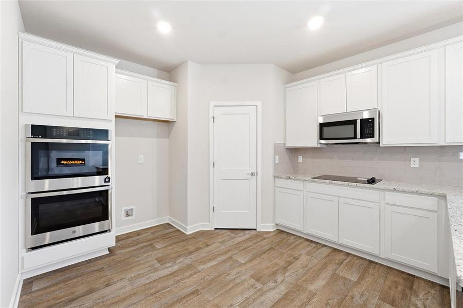 Furnished interior view inside a new home in Fern Dale, Fairburn (Image 9).