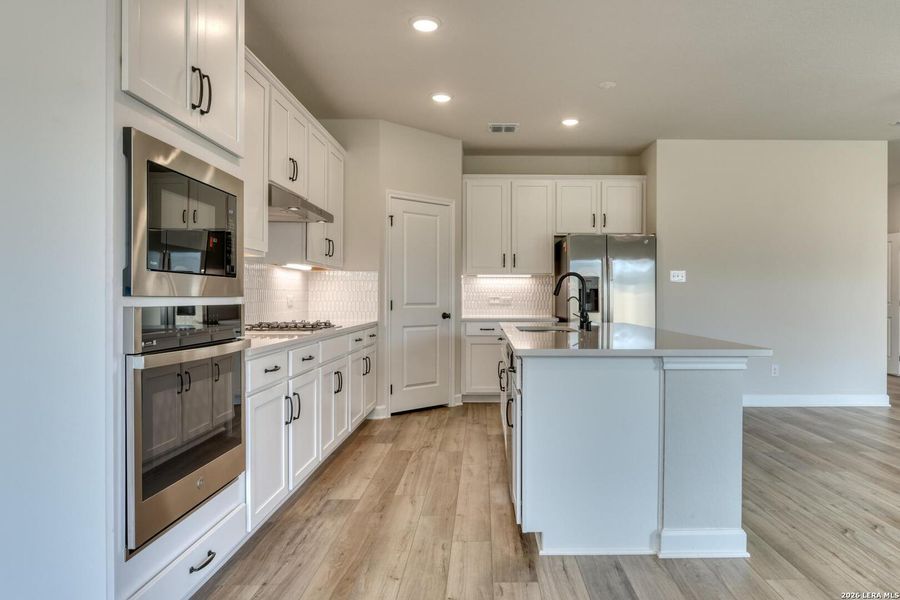 Furnished interior view inside a new home in Hennersby Hollow, San Antonio (Image 3).