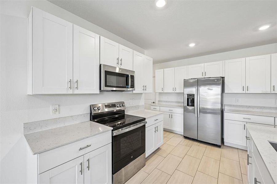 Furnished interior view inside a new home in Seaire, Parrish (Image 11).