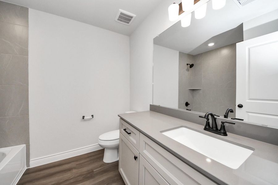 Furnished interior view inside a new home in Lexington Heights, Willis (Image 16).