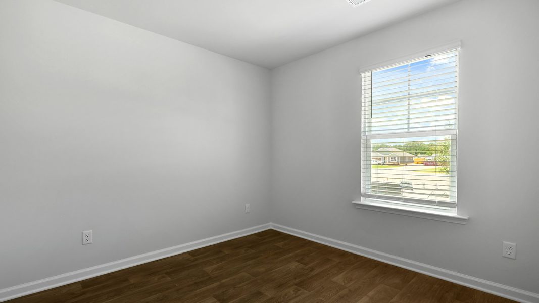 Spacious, unfurnished interior of a new home in Pine Hills at Cane Bay, Summerville (Image 12).