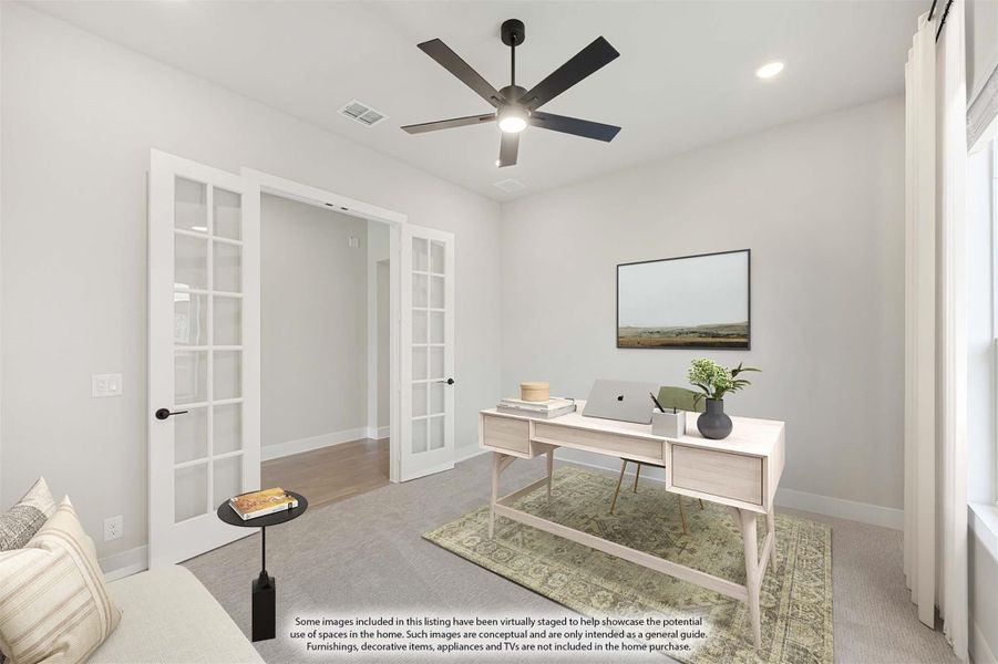 Home office with French doors, ceiling fan, light wood desk, and carpet flooring