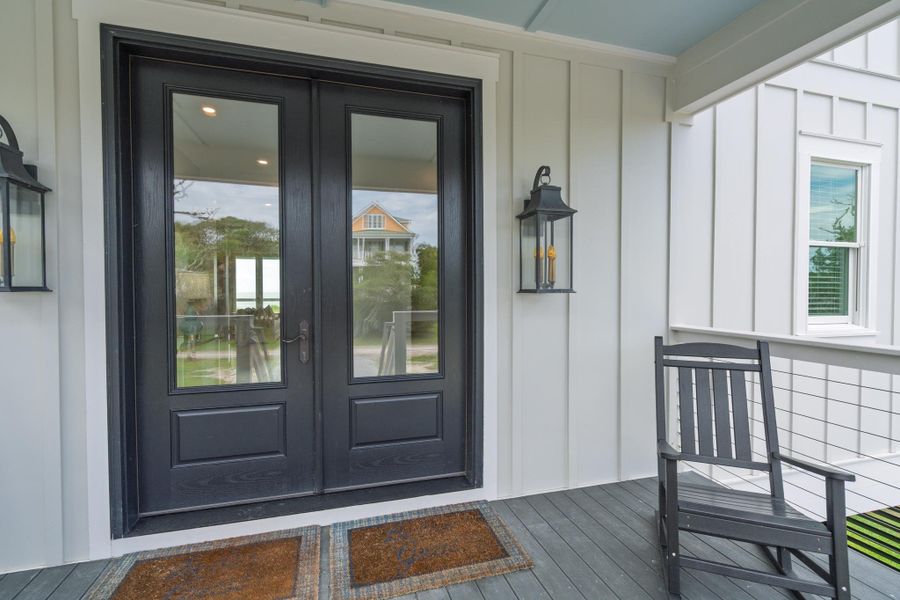 Exterior details and patio area of a home in , Edisto Island (Image 31).