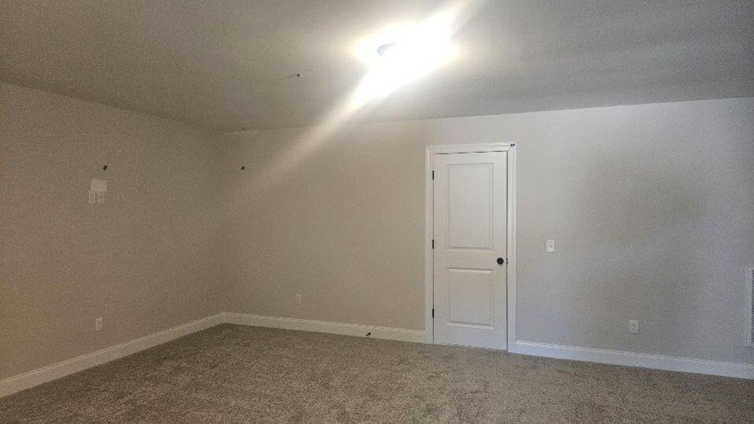 Spacious, unfurnished interior of a new home in The Enclave at French Quarter Creek, Huger (Image 16).