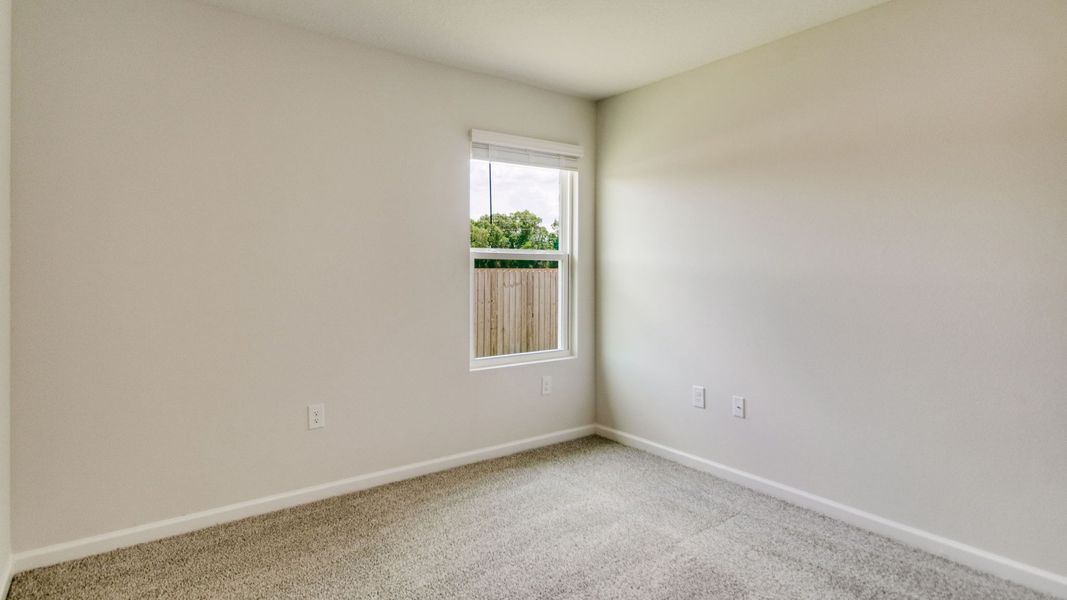 Spacious, unfurnished interior of a new home in The Enclave at Bar W Ranch, Baker (Image 25).