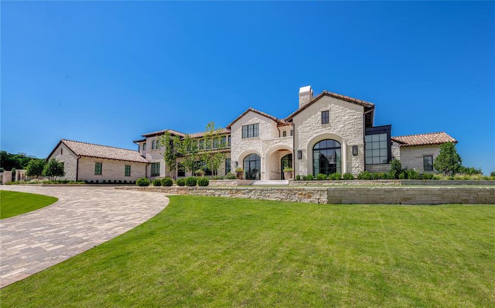 Premium elevated corner lot, with all stone retaining walls