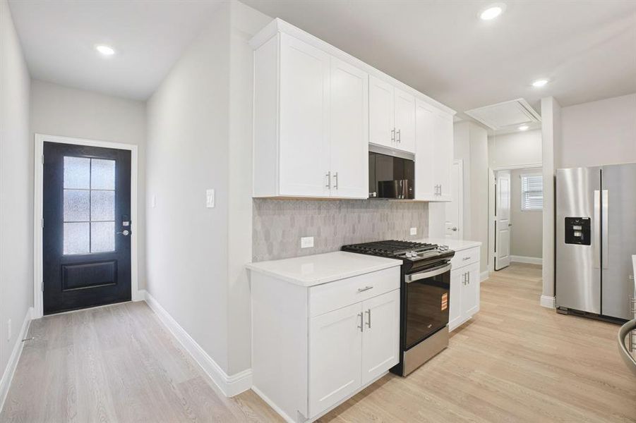 Furnished interior view inside a new home in Parks at Foster Crossing - Spring Series, Anna (Image 6).