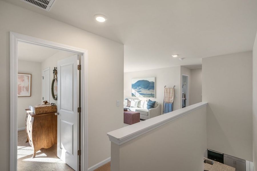 Representative furnished interior of a home built from the HAYDEN by D.R. Horton in Gretchen Pines, West End (Image 23).