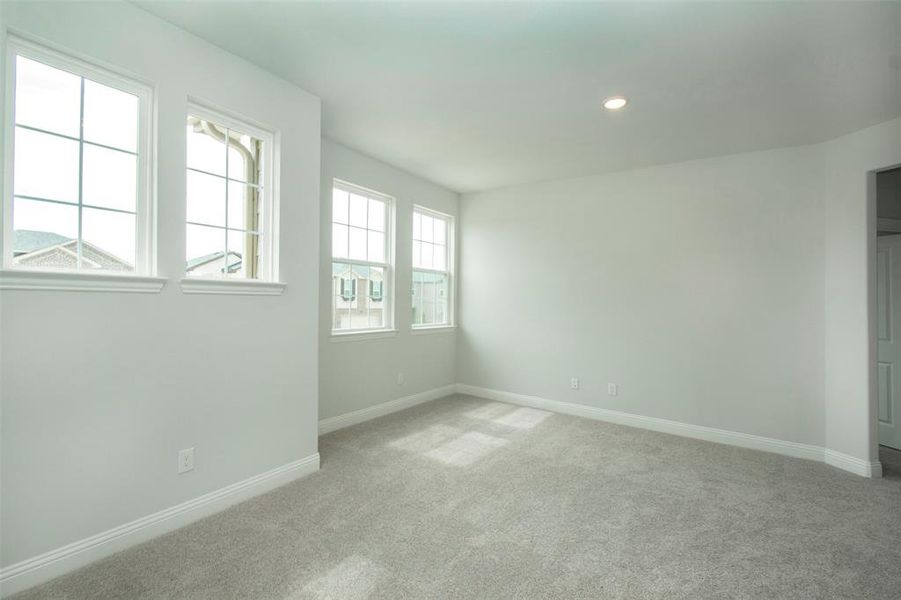 Unfurnished bedroom featuring carpet floors, baseboards, and recessed lighting Unfurnished bedroom featuring carpet floors, baseboards, and recessed lighting