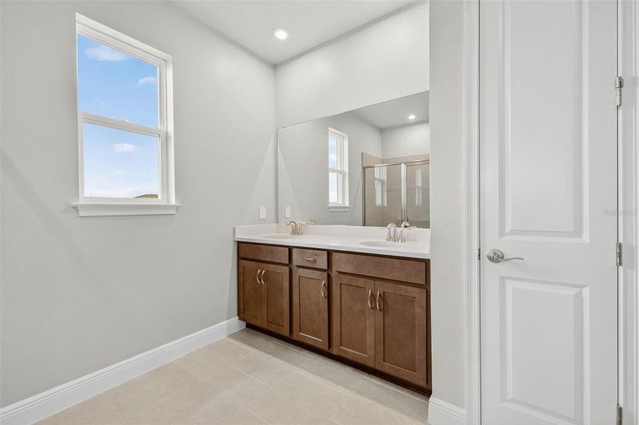 Furnished interior view inside a new home in Windwater, Parrish (Image 11).